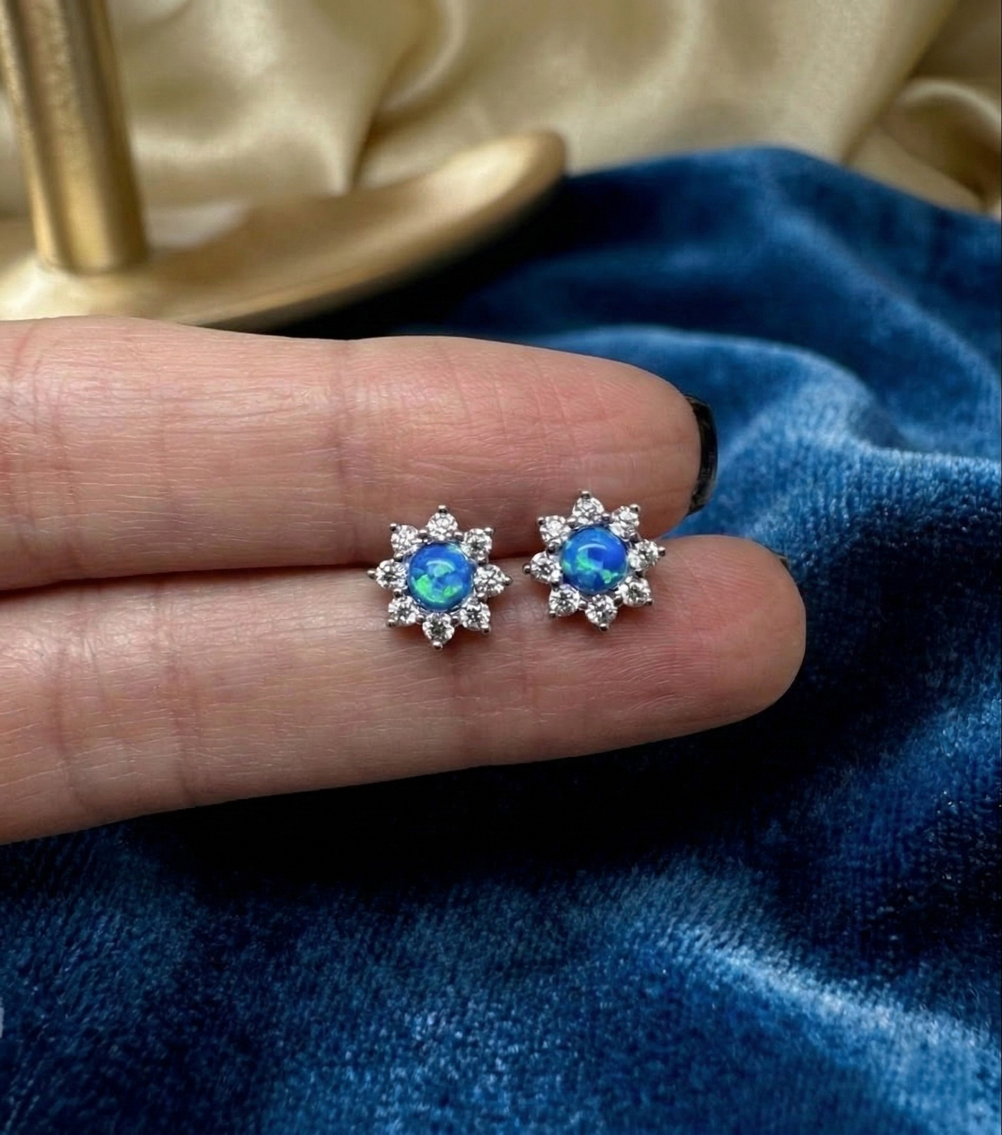 dainty blue opal stud earrings floral design