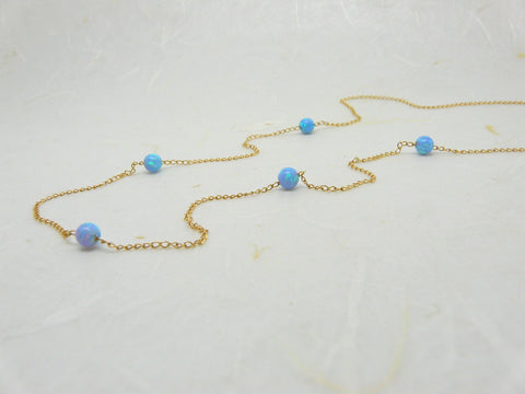 Delicate necklace with 5 opal beads